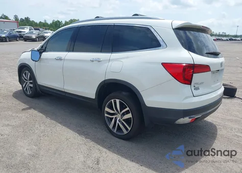 2017 Honda Pilot Touring from USA, damaged, VIN 5FNYF5H91HB032650